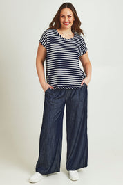 Model Jane wearing size 14 of The Striped Drape Tee in colour Navywhite (Blue), from the front, showing the whole outfit