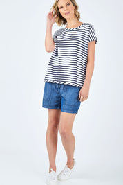 Model Chelsea wearing size 10 of The Drape Tee in colour NavyStripe (Blue), from the front, showing the whole outfit