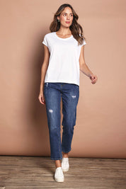 Model Madeline wearing size 10 of The Drape Tee in colour White (White), from the front, showing the whole outfit