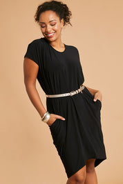 Model Noli wearing size 14 of The Drape Jersey Dress in colour Black (Black), from the front, showing the whole outfit