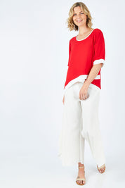 Model Chelsea wearing size 10 of The Contrast Trim Blouse in colour Red (Red), from the front, showing the whole outfit