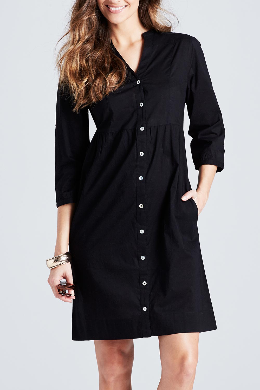 Model Anna wearing size 10 of The Cotton Shirt Dress in colour Black (Black), from the front, cropped image