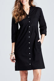 Model Anna wearing size 10 of The Cotton Shirt Dress in colour Black (Black), from the front, cropped image