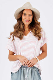 Model Clementine wearing size 10 of The V Split Jersey Tee in colour PinkStripe (Pink), from the front, cropped image