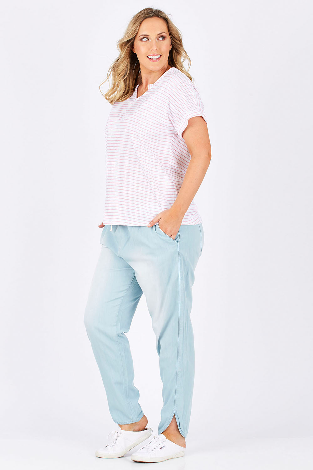 Model Jess wearing size 14 of The V Split Jersey Tee in colour PinkStripe (Pink), from the front, showing the whole outfit