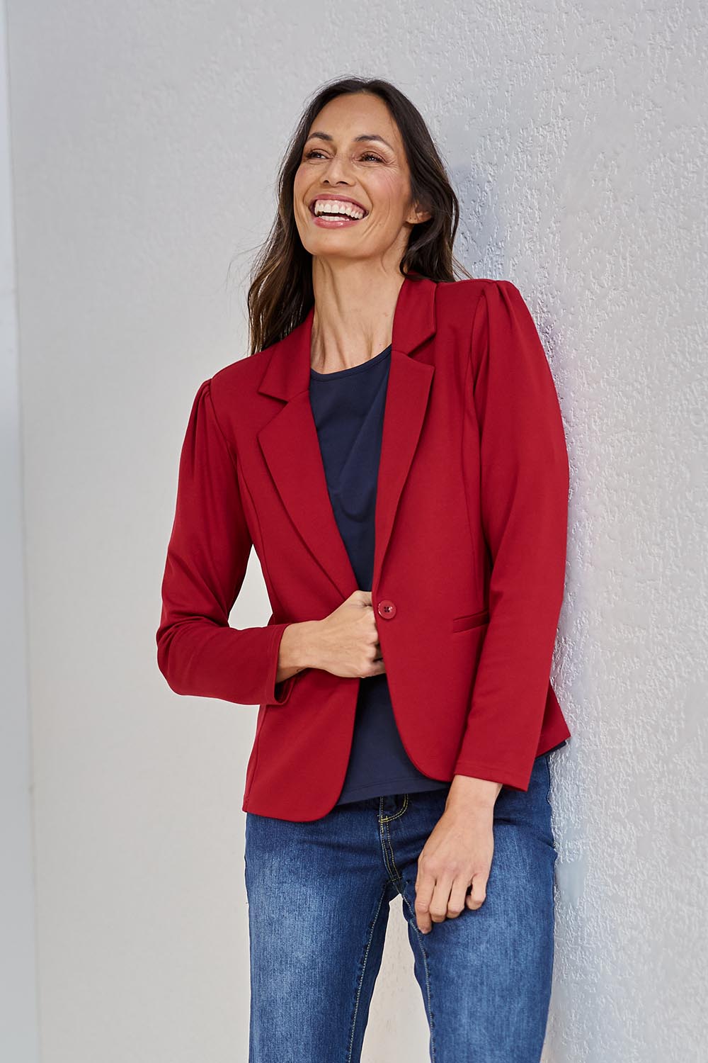 Model Amanda wearing size 10 of The Ponte Blazer in colour Brick (Red), from the front, showing the whole outfit