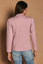 Model Madeline wearing size 10 of The Ponte Blazer in colour Dustypink (Pink), from the back