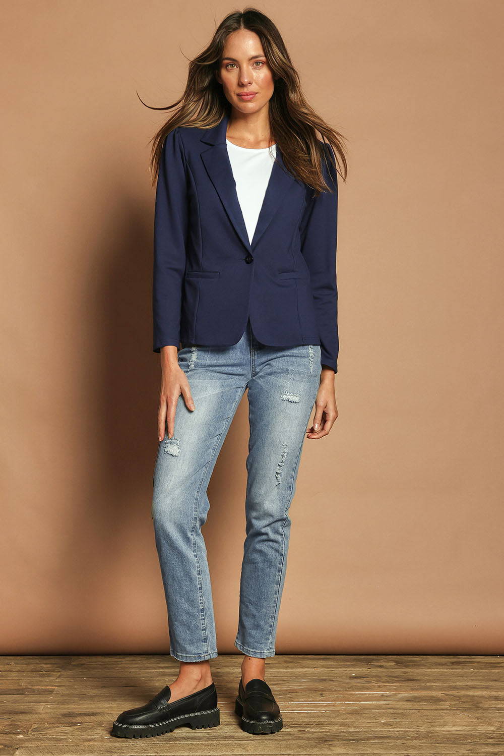 Model Madeline wearing size 10 of The Ponte Blazer in colour Navy (Blue), from the front, showing the whole outfit