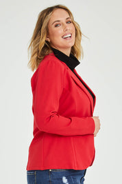 Model Jess wearing size 14 of The Ponte Blazer in colour Red (Red), from the front, cropped image