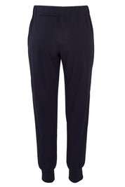 Product shot of The Basic Keeper Pant in colour Navy (Blue), from the back