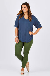 Model Laura wearing size 12 of The Stella Tee in colour Blue (Blue), from the front, showing the whole outfit