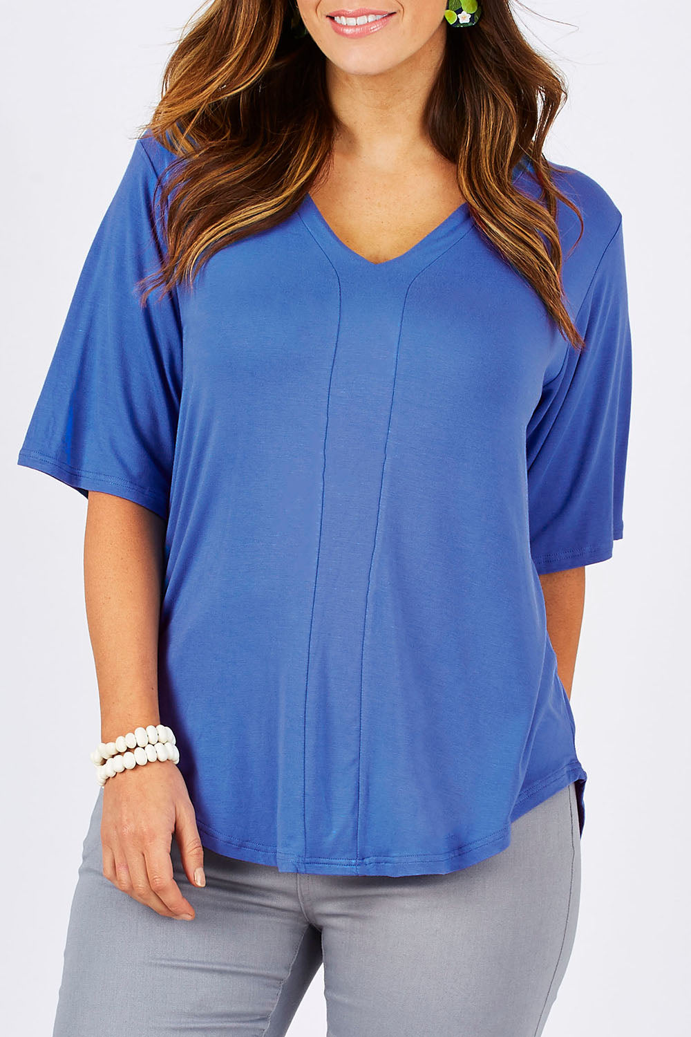 Model Laura wearing size 12 of The Stella Tee in colour Marine (Black), from the front, cropped image