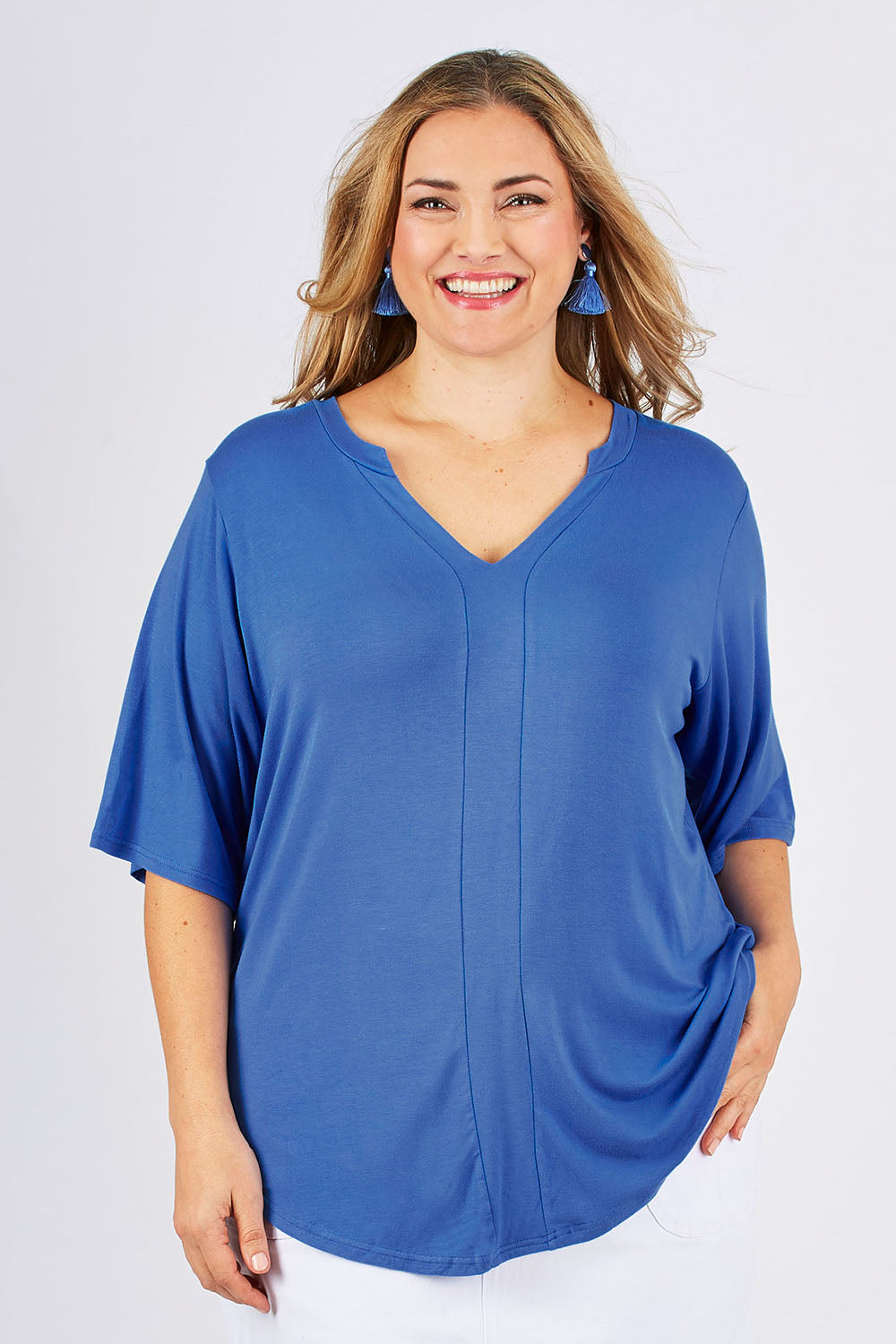 Model Ljubenka wearing size 18 of The Stella Tee in colour Marine (Black), from the front, cropped image