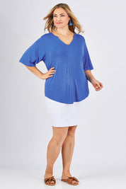 Model Ljubenka wearing size 18 of The Stella Tee in colour Marine (Black), from the front, showing the whole outfit
