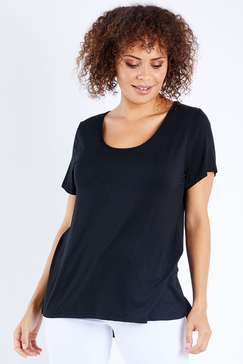 Model Lala wearing size 10 of The Round Neck Bamboo Tee in colour Black (Black), from the front, cropped image