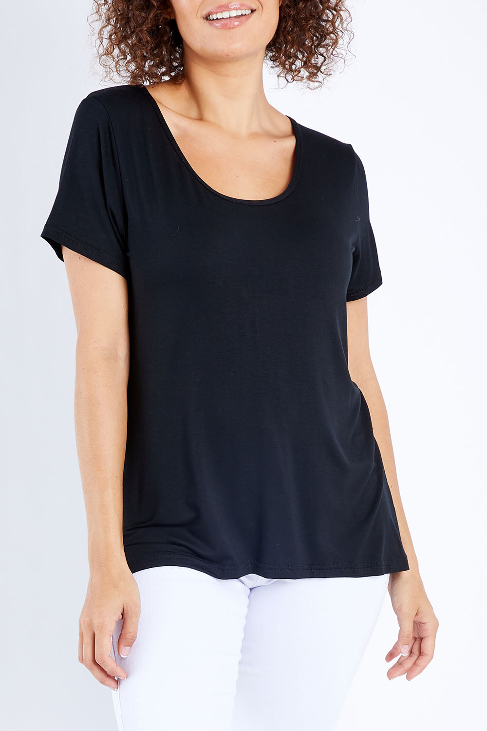 Model Lala wearing size 10 of The Round Neck Bamboo Tee in colour Black (Black), from the front, cropped image