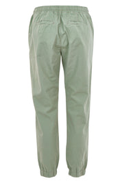 Product shot of The Weekender Pant in colour Khaki (Green), from the back