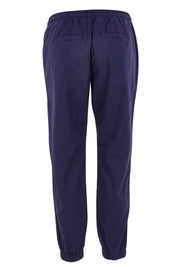 Product shot of The Weekender Pant in colour Navy (Blue), from the back