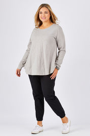 Model Ljubenka wearing size 18 of The Weekender Pant in colour WashedBlac (Black), from the front, showing the whole outfit