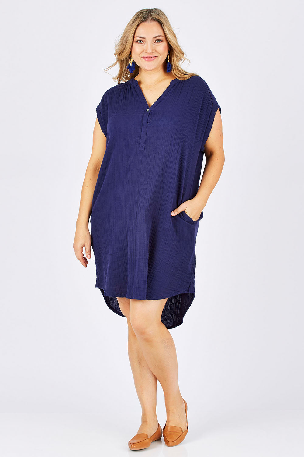 Model Ljubenka wearing size 18 of The Bonded Cotton Dress in colour FrenchNavy (Blue), from the front, showing the whole outfit