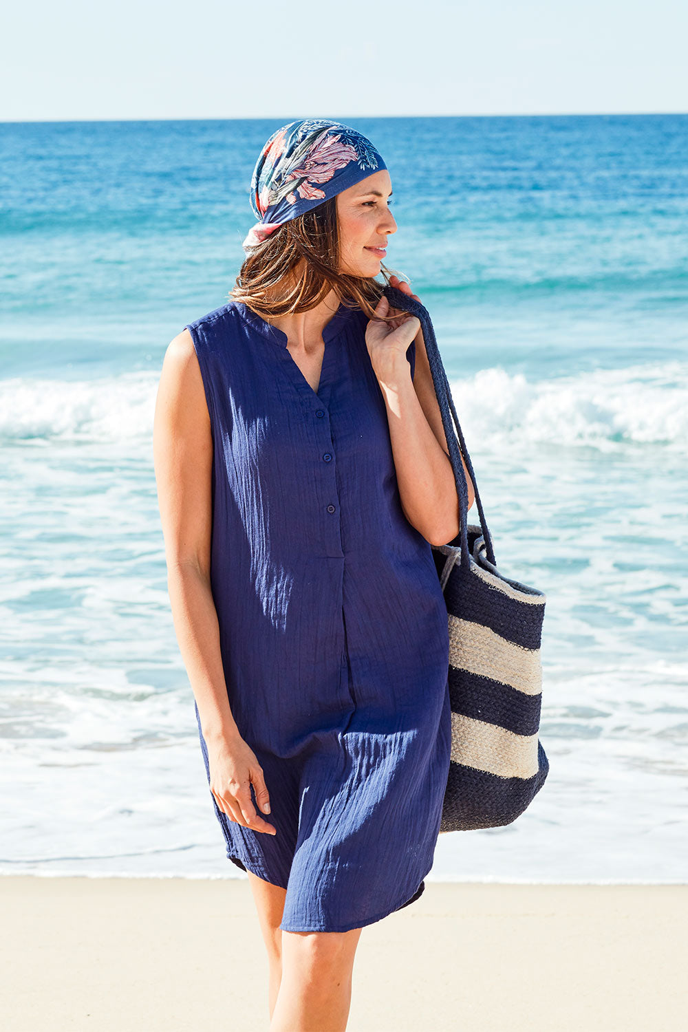 Model Amanda wearing size 10 of The Bonded Cotton Tunic Dress in colour Navy (Blue), from the front, showing the whole outfit