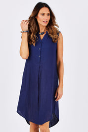 Model Clementine wearing size 10 of The Bonded Cotton Tunic Dress in colour Navy (Blue), from the front, cropped image
