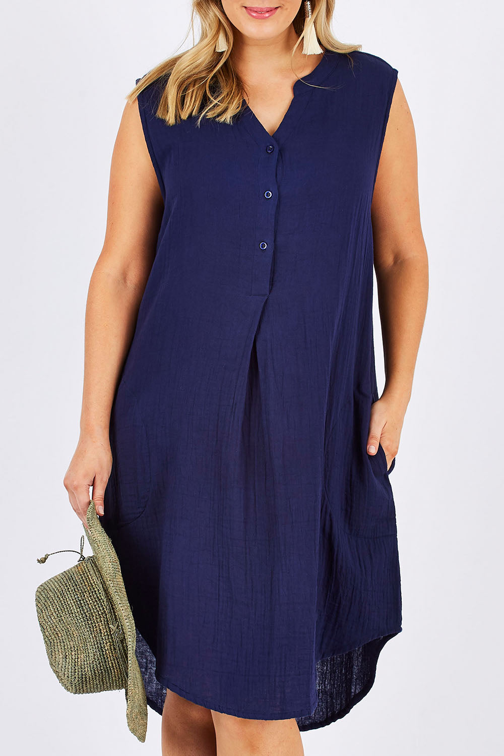 Model Jess wearing size 12 of The Bonded Cotton Tunic Dress in colour Navy (Blue), from the front, cropped image