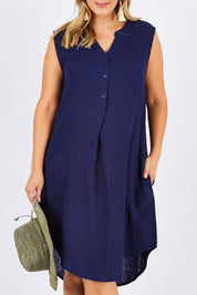 Model Jess wearing size 12 of The Bonded Cotton Tunic Dress in colour Navy (Blue), from the front, cropped image
