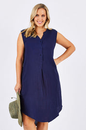 Model Jess wearing size 12 of The Bonded Cotton Tunic Dress in colour Navy (Blue), from the front, cropped image