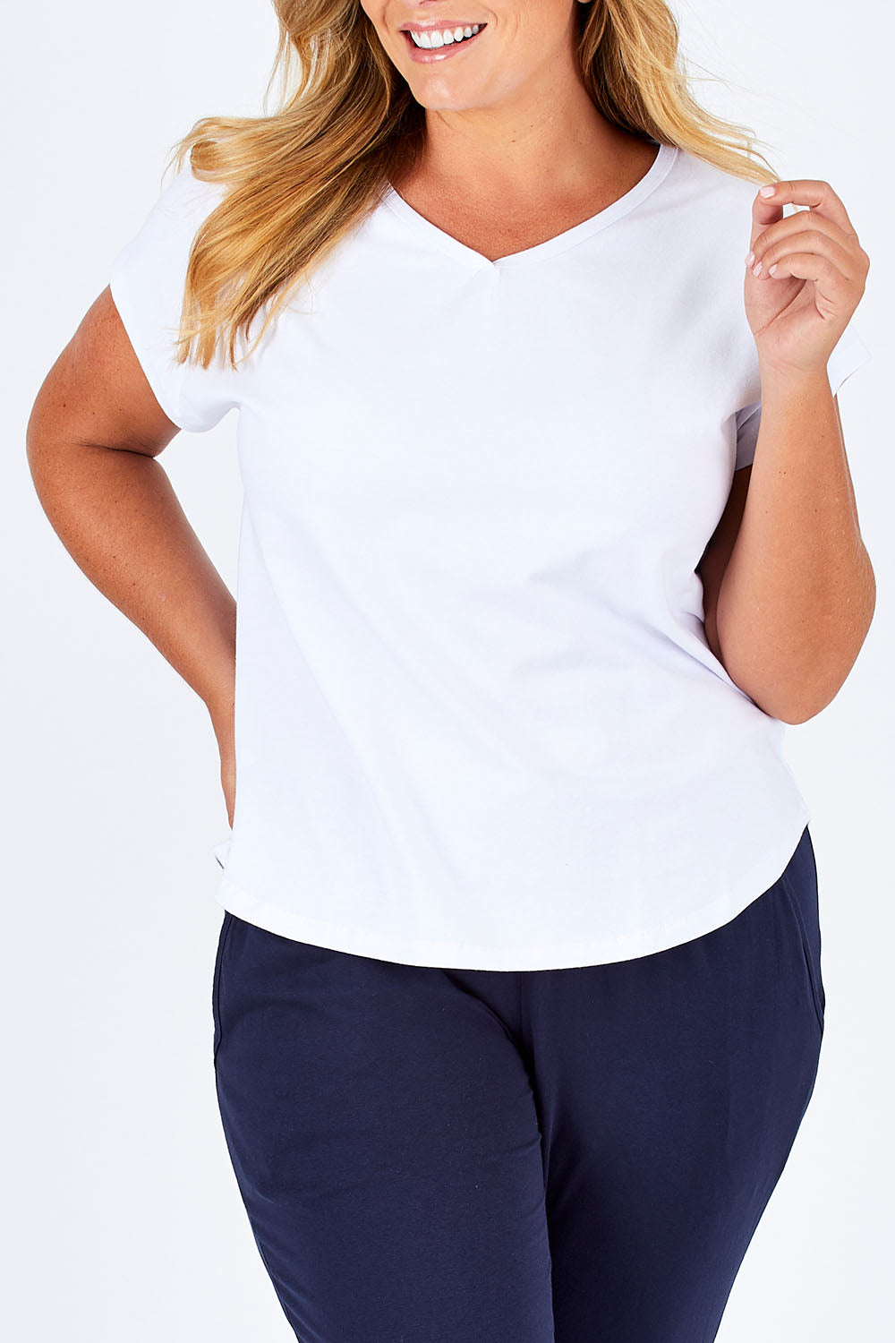 Model Fiona wearing size 16 of The Essential Layering Tee in colour White (White), from the front, cropped image