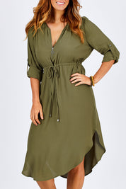 Model Laura wearing size 12 of The Zip Front Midi Dress in colour Khaki (Green), from the front, cropped image
