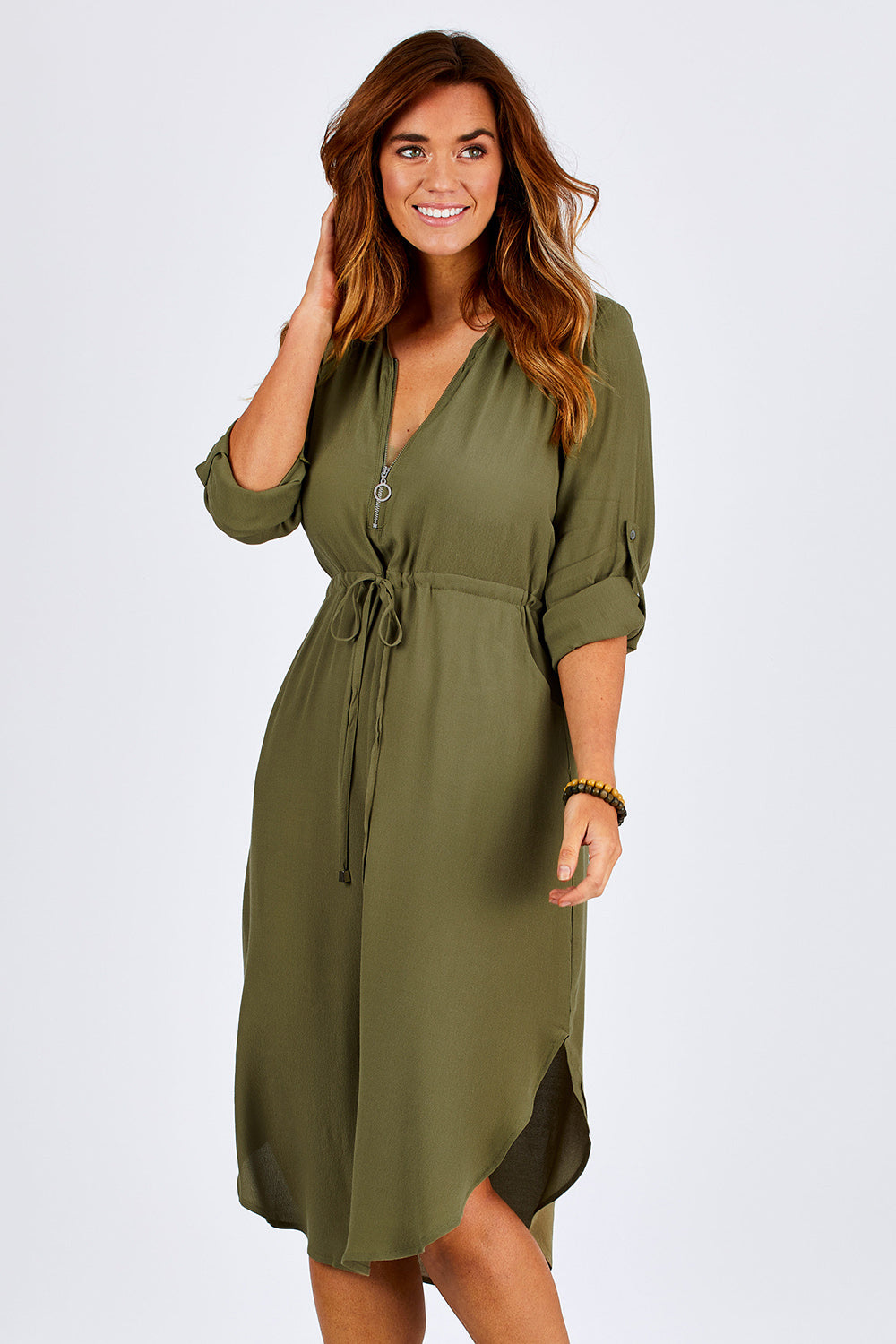 Model Laura wearing size 12 of The Zip Front Midi Dress in colour Khaki (Green), from the front, cropped image