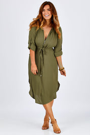 Model Laura wearing size 12 of The Zip Front Midi Dress in colour Khaki (Green), from the front, showing the whole outfit