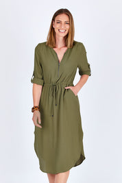 Model Riina wearing size 10 of The Zip Front Midi Dress in colour Khaki (Green), from the front, cropped image
