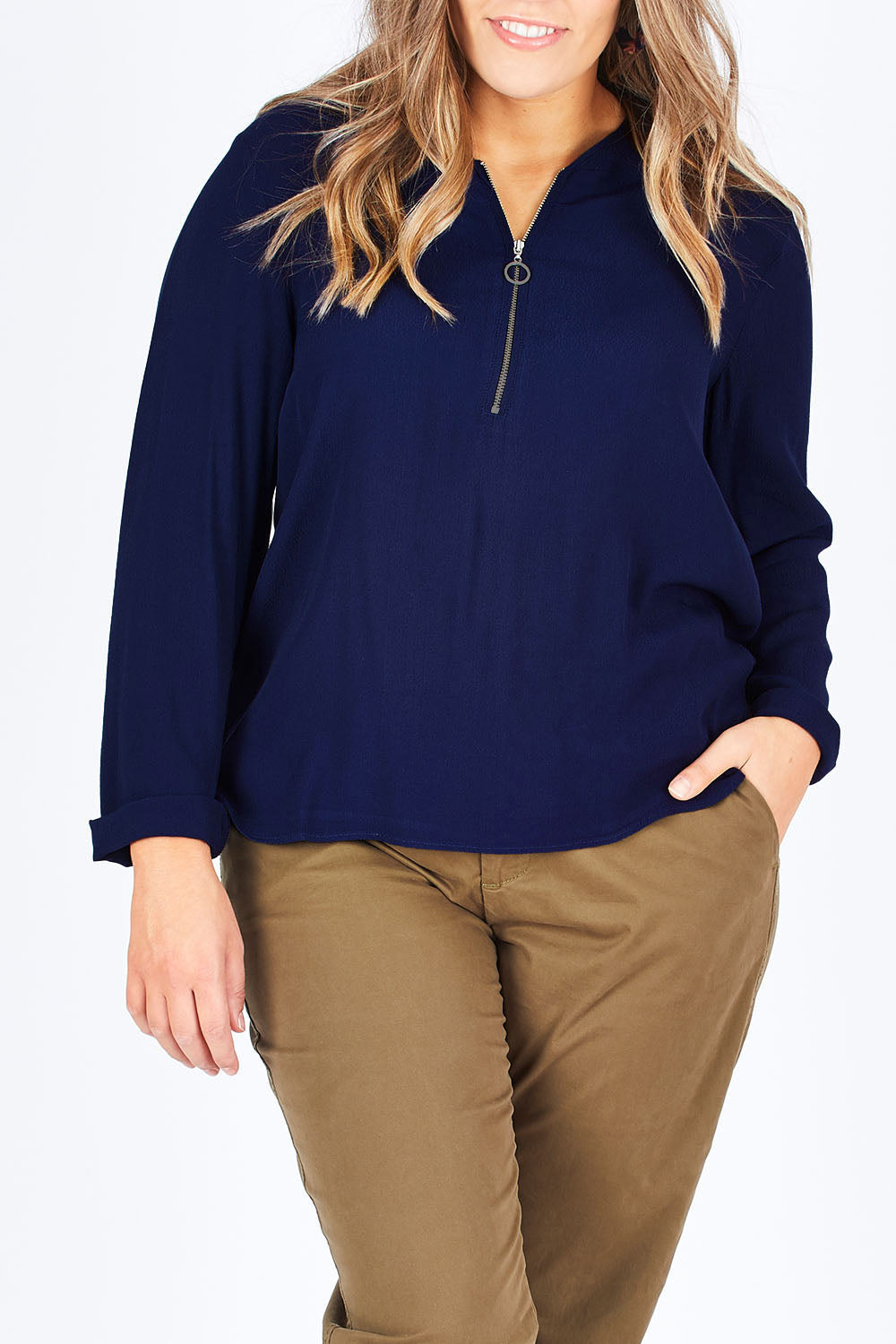 Model Natalia wearing size 14 of The Zip Front Blouse in colour Navy (Blue), from the front, cropped image