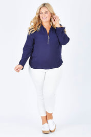 Model Sophie wearing size 18 of The Zip Front Blouse in colour Navy (Blue), from the front, showing the whole outfit