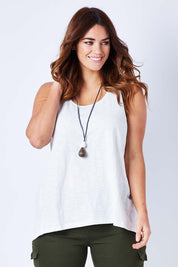 Model Laura wearing size 12 of The Pintuck Back Tank in colour OffWhite (White), from the front, cropped image