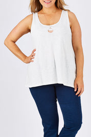 Model Ljubenka wearing size 18 of The Pintuck Back Tank in colour OffWhite (White), from the front, cropped image