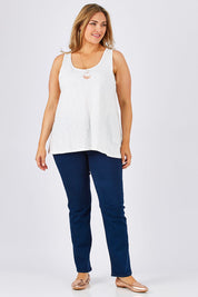 Model Ljubenka wearing size 18 of The Pintuck Back Tank in colour OffWhite (White), from the front, showing the whole outfit