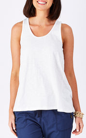 Model Perrie wearing size 10 of The Pintuck Back Tank in colour OffWhite (White), from the front, cropped image