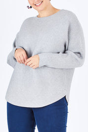 Model Stefania wearing size L of The Daily Essential Jumper in colour Grey (Grey), from the front, cropped image