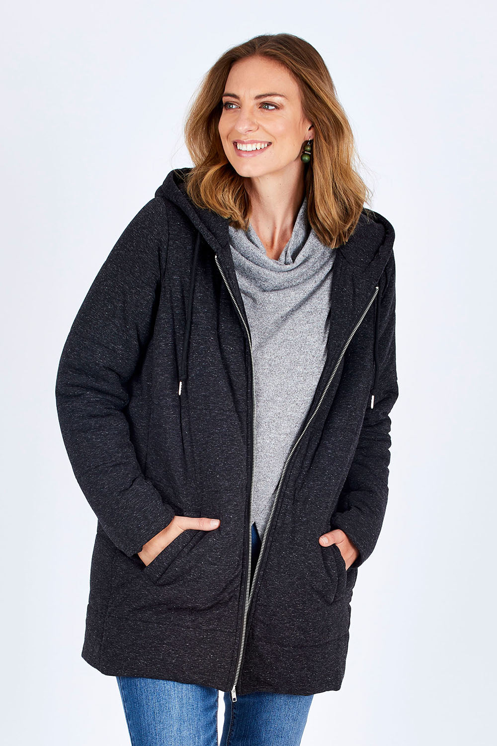 Model Riina wearing size 10 of The Luxe Puffer Jacket in colour Charcoal (Black), from the front, cropped image