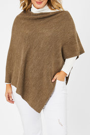 Model Jess wearing size L of The Perfect Poncho in colour Natural, from the front, cropped image