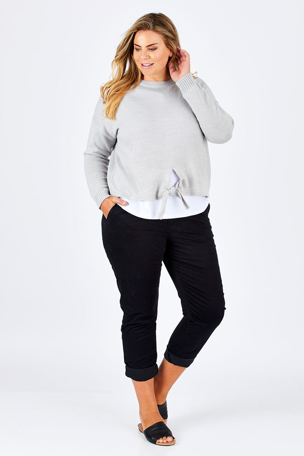 Model Fiona wearing size 16 of The Essential Chino in colour Black (Black), from the front, showing the whole outfit