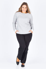 Model Natalia wearing size 14 of The Essential Chino in colour Black (Black), from the front, showing the whole outfit