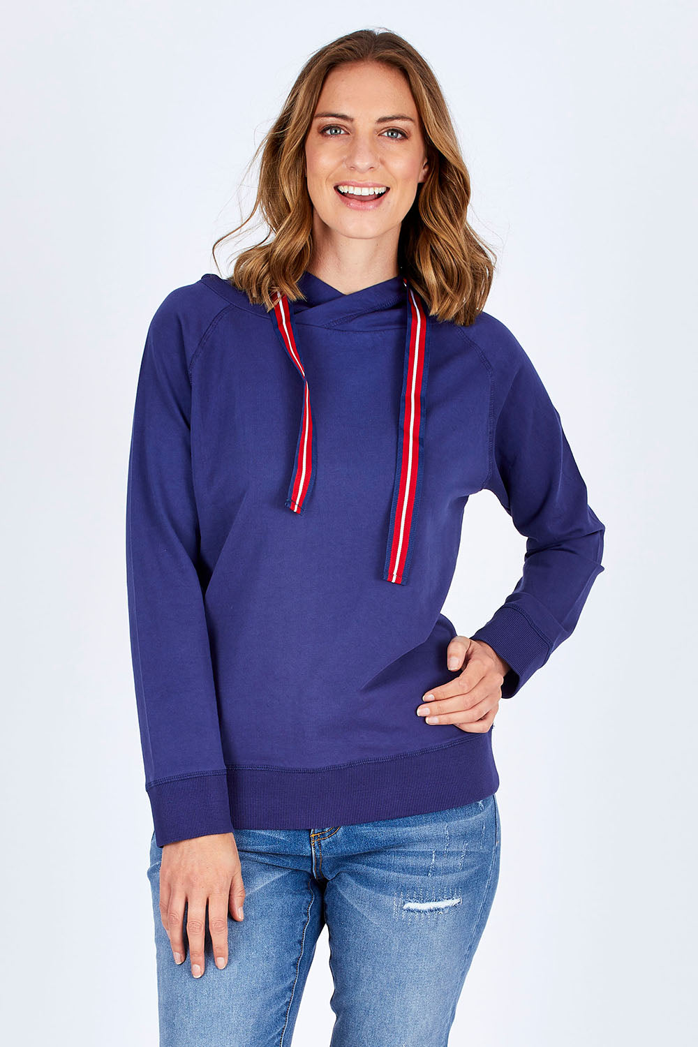 Model Riina wearing size 10 of The Tie Detail Hoody in colour FrenchBlue (Blue), from the front, cropped image