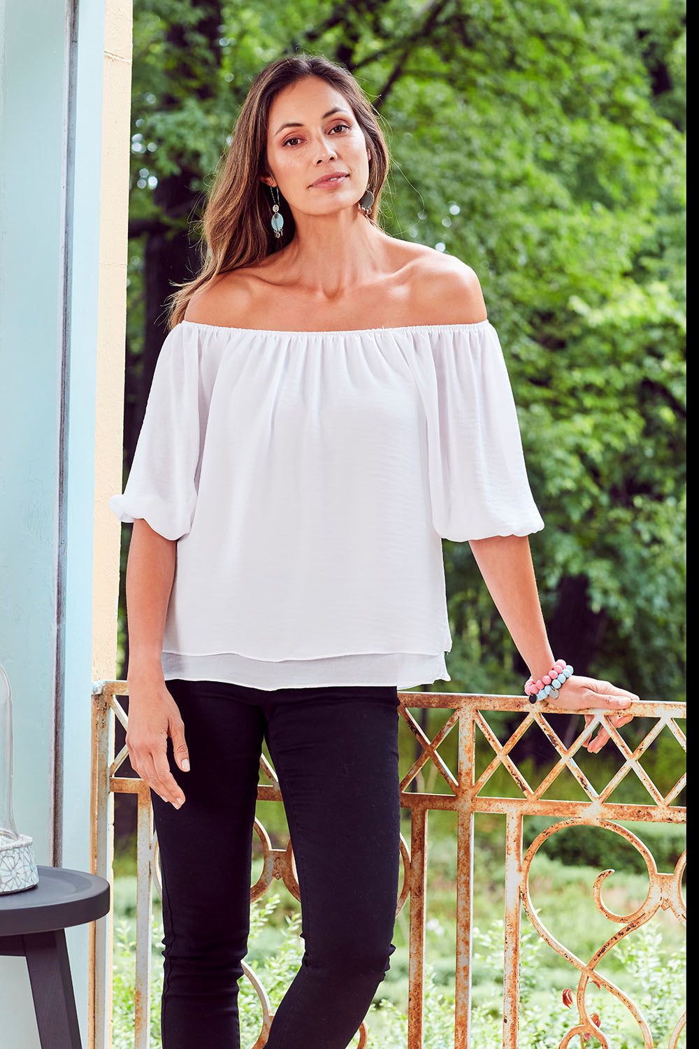 Model Amanda wearing size 10 of The Double Layer Top in colour White (White), from the front, showing the whole outfit