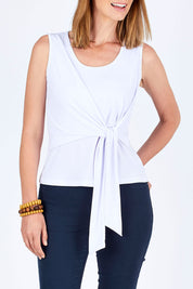 Model Riina wearing size 10 of The Tie Front Tank in colour White (White), from the front, cropped image