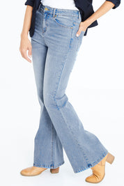 Model Cara wearing size 10 of The Bootcut Jean in colour Lightdenim (Blue), from the front, cropped image