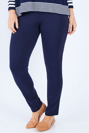 Model Laura wearing size 14 of The Ponte Pant in colour Navy (Blue), from the front, cropped image